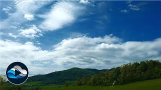 The cloudy sky clears over the landscape time lapse, Relax in Nature with Cloud Observe