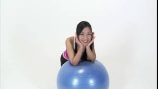 Asian Girl Leaning On Big Exercise Ball