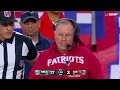 Bill Belichick spikes his challenge flag into the ground