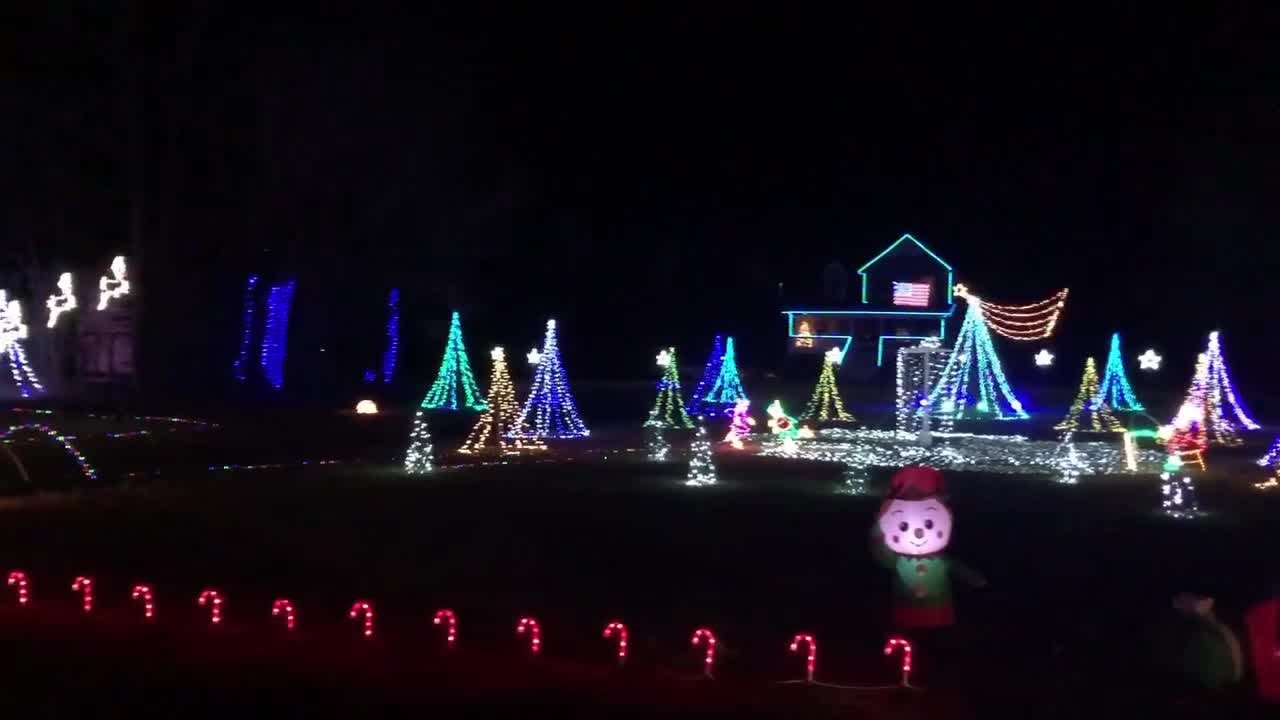 Holiday lights 2020 Suffolk display has a shooting star, forest of