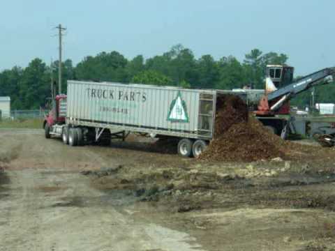 Dump truck excavator