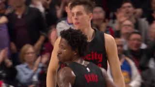 Zach Collins puts a cap on the game with a one hand putback slam