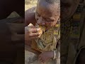 Hadzabe Cooking and Sharing a Simple Wild Feast #Hadzabe #WildFeast #WildMeat #TribalLife #shorts