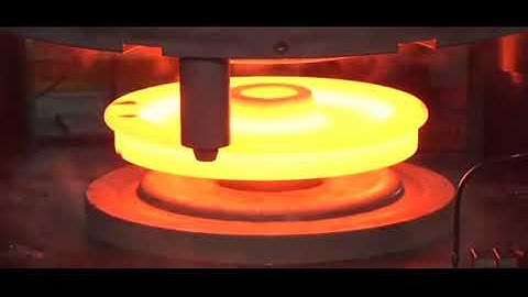 Amazing train wheel production process with an automated forging line.