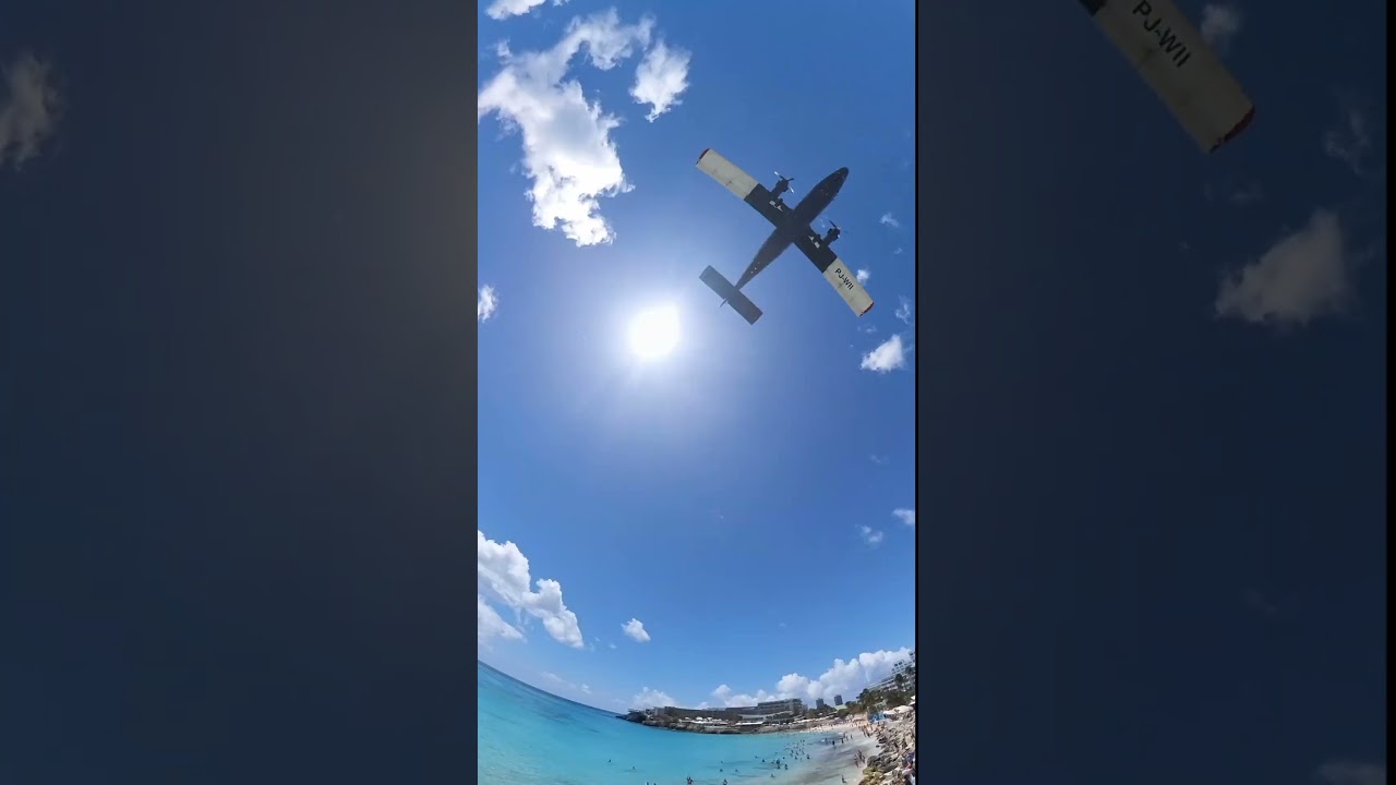 Winair Plane Soars Over My Head at St. Maarten Airport, on Maho Beach
