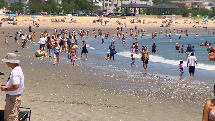 People flock to Massachusetts beaches on sunny, warm Fourth of July