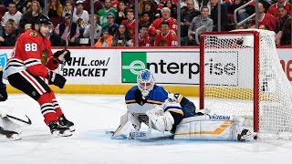 Patrick Kane tucks a gorgeous backhander under the bar