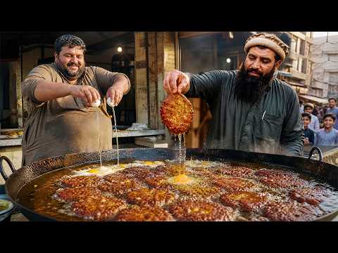 A special Chapli Kabab, where the skilled person dips their hand in oil and raises the Kabab