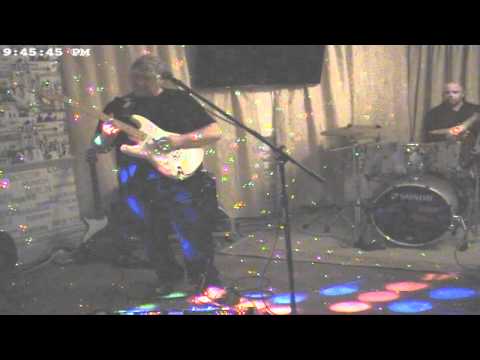 COMFORTABLEY NUMB - BY THE RAINMAKERS UK