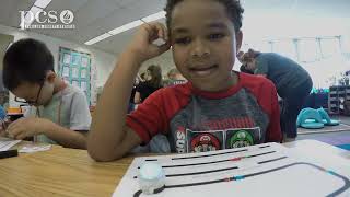 First grade students learn about coding with Ozobots!