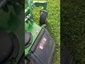 Jermaine Doss Jr 5 year old cutting grass on John deere