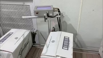 Meenjet MX1 Printing Two Line Date Code on White Cases