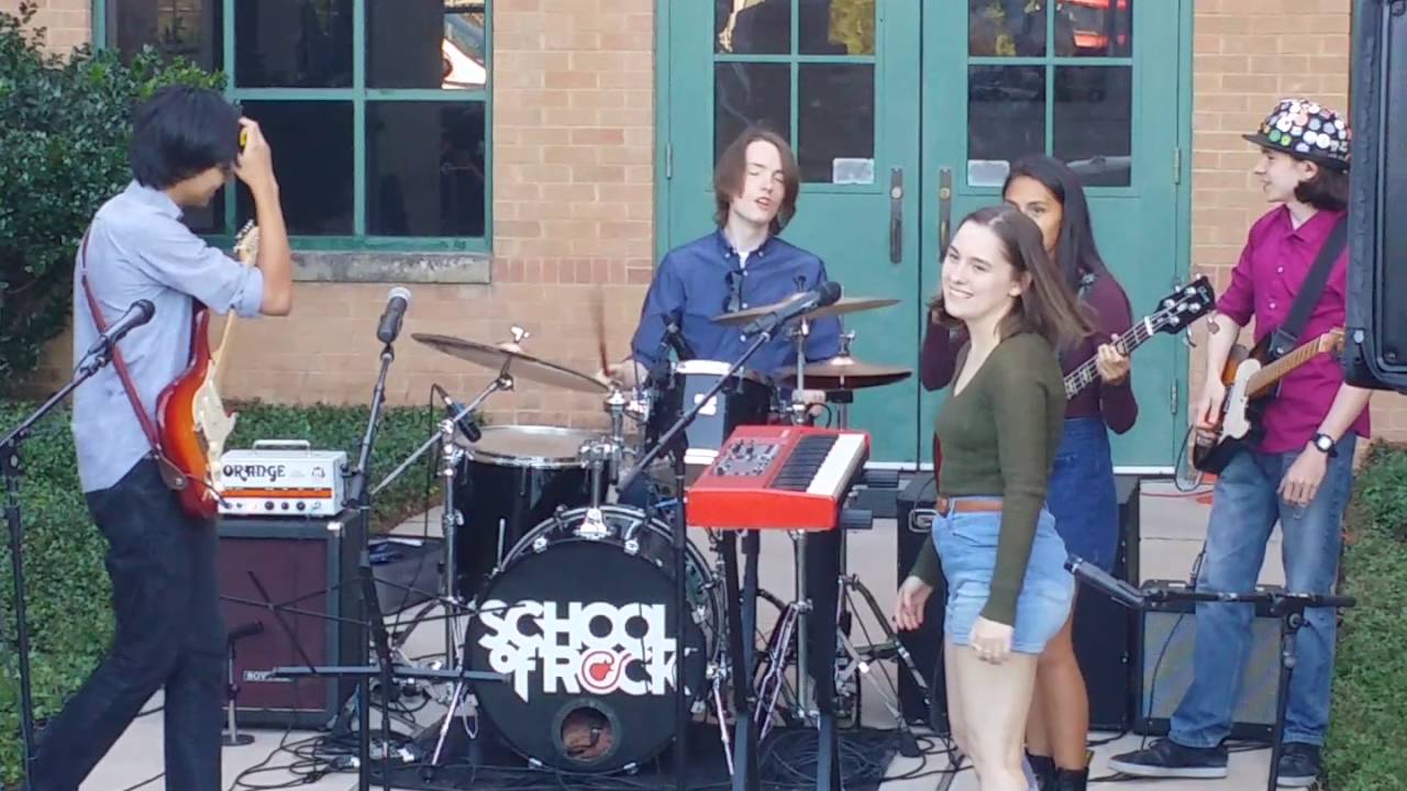Sarah and the Austin School of Rock B Team singing 