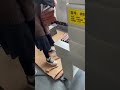 Fully automatic cutting and shrink wrapping machine