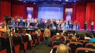 DrupalCon Asia prenote dance with audience on the stage