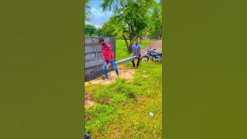 Readymade cement compound columns are lifted and carried by the labour in this manner#readymadewall