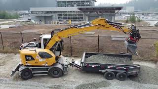 Liebherr 918 Compact with Dump Trailer Prepping for Asphalt 4K