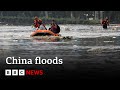 China floods heavy flooding sees tens of thousands evacuated  bbc news