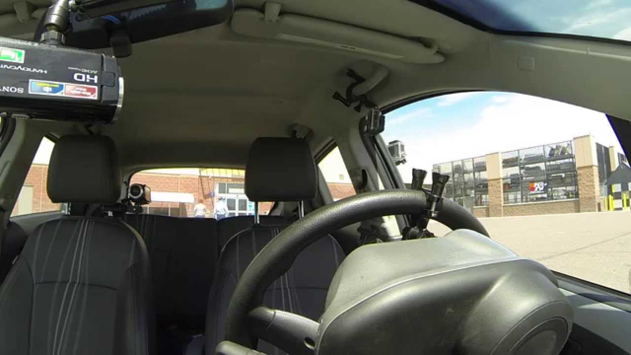 Customers enter Walmart Tire & Lube Express Entrance, 2 April 2015