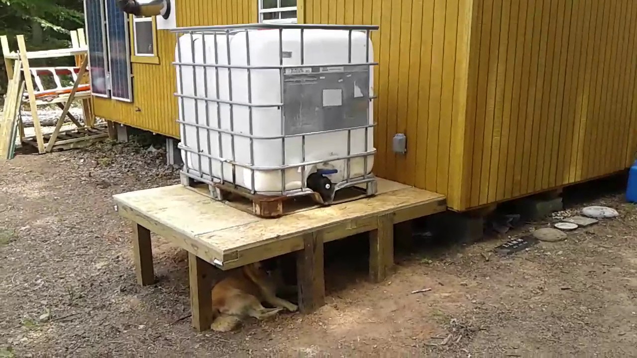 Youtube The Start Of Housing The Water Tank And Pump Etc Off Grid Cabin Water Tank Solar Water