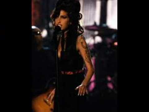 Amy Winehouse "Hey Little Rich Girl" showcase with Pictures from her performance at the 2007 MTV Movie Awards. Find this on the b-side "Back To Black" import single. www.amazon.com