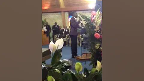 George Potts Young signing at a funeral
