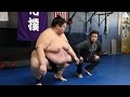 'Average Andy' with World Sumo Champion Yama