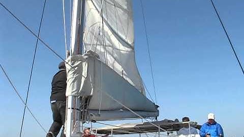 Dropping the main sail brings a feeling of finality to our cruise. But wait, there