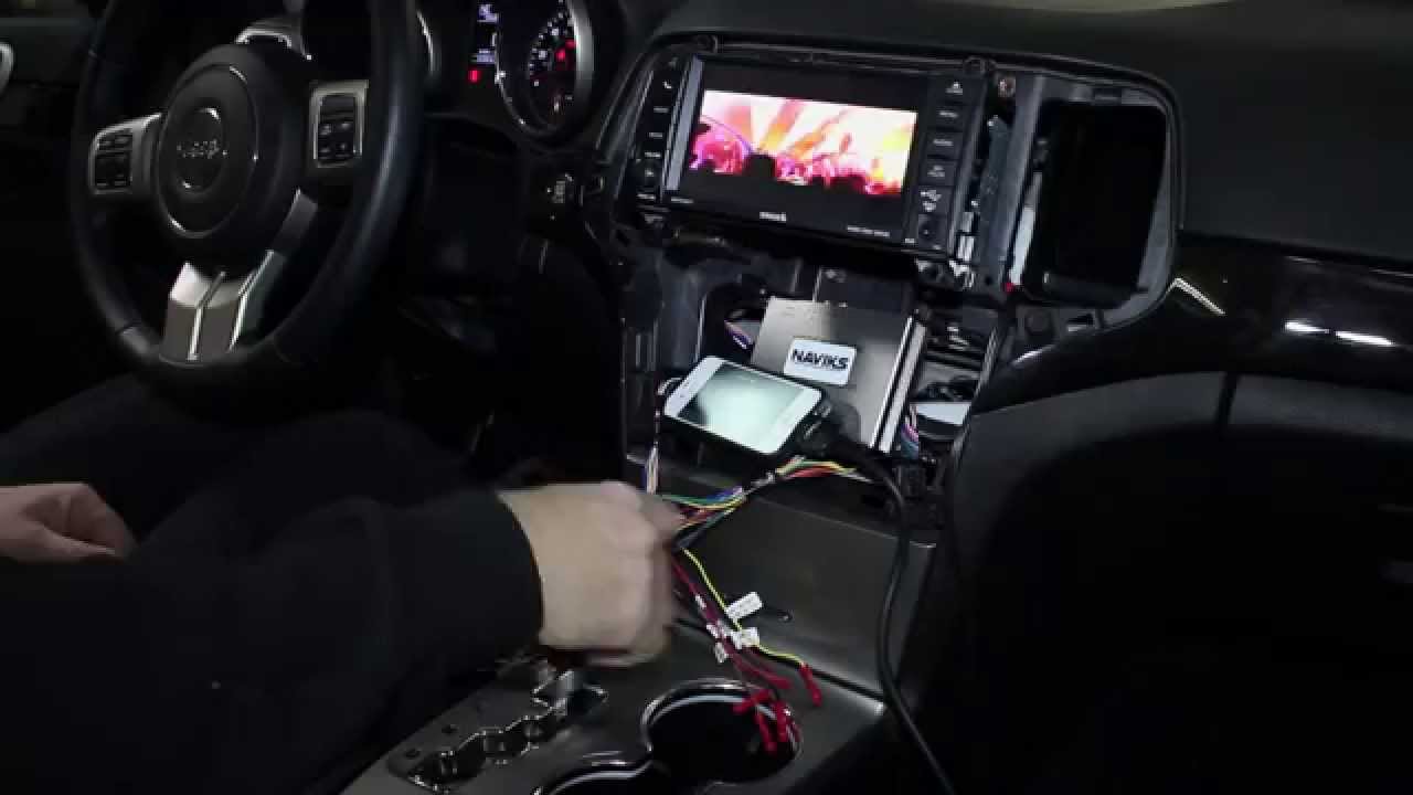 2013 Jeep Grand Cherokee Enable Video in Motion Add iPhone iPad Backup