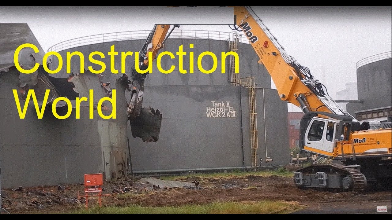 Excavator Liebherr 974 longfront demolition site huge metal fuel tanks - cool sound