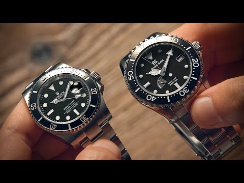 Rolex Submariner vs Grand Seiko SBGA229 | Watchfinder & Co.