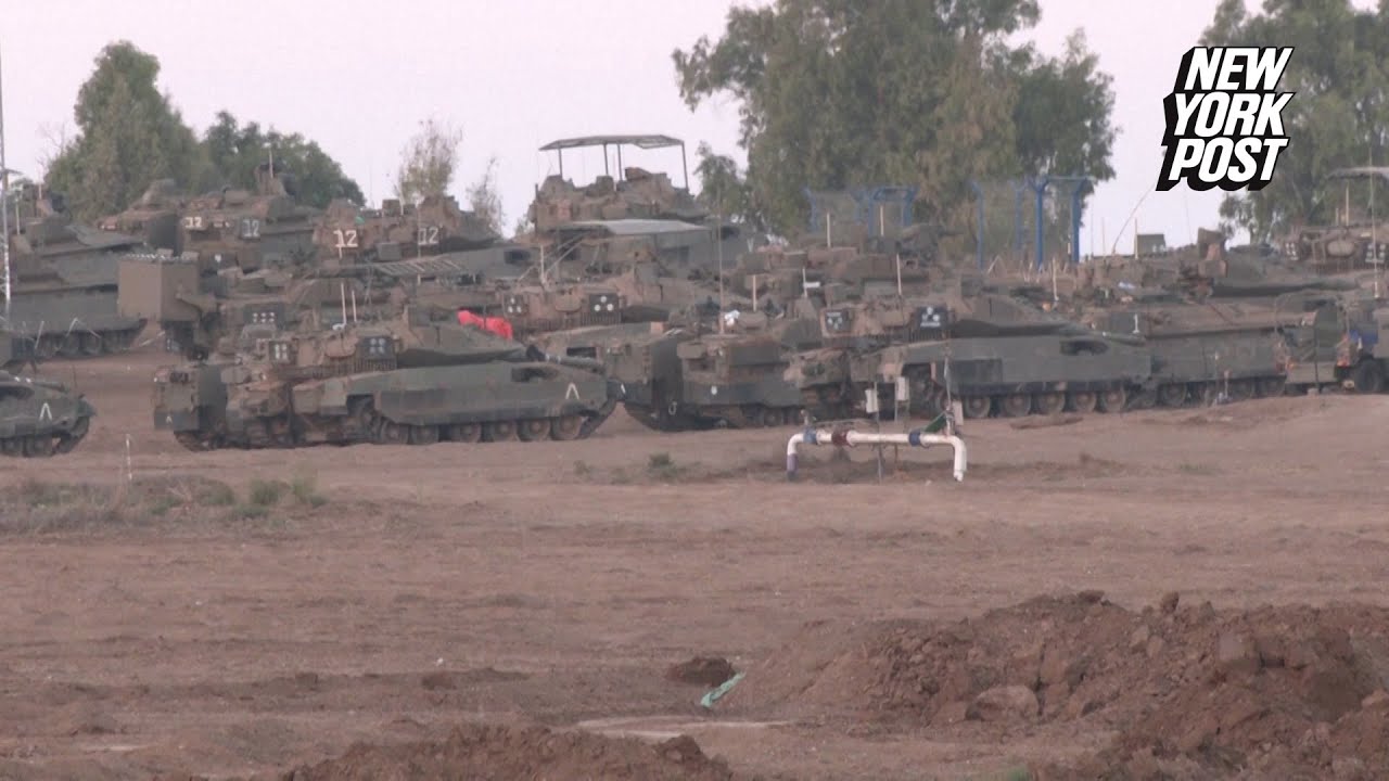 Israeli tanks continue to station at Gaza borders as ground invasion looms Israeli tanks continue to station at Gaza borders as ground invasion looms