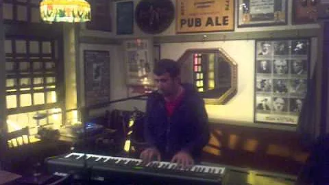 Tim Kaye at performs at McGillin's Open Mic.