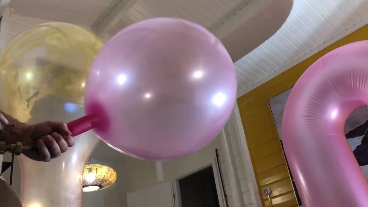 Filling big pink balloon with helium YouTube