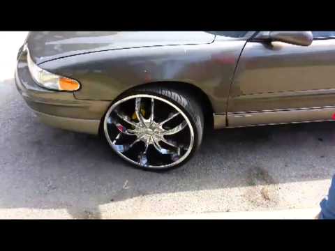 2000 buick regal on 24&rsquo;s  cut wheel and put spacer