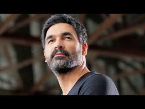 Uğur Işılak İçinde Bir Sızı Kalır 