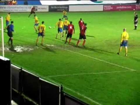 Northern Premier League 1st Division (South), Saturday 21st November 2009 Sheffield FC 2 (Cusworth 3, 76) Lincoln United 0 Att: 215 Featuring Club manager Chris Dolby bravely throwing himself between player and pie. Film: Paul McKenzie Editor: David Cound