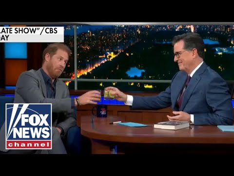 Prince Harry scrutinized for taking shots with Stephen Colbert
