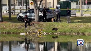 Woman found dead inside North Miami Beach canal, police say