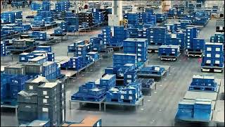 Collaboration of AGVs, Automated Forklifts & Robotic Arms for Smart Warehousin 