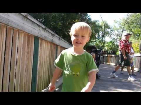 Toren feeding fish and ducks at Busch Gardens