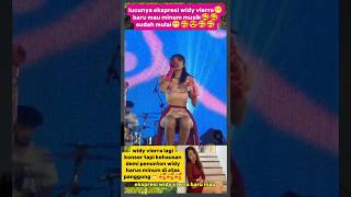 Widy Vierras Expression Just About To Drink The Music Has Started ...