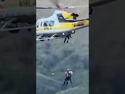 Rescue team airlifts hiker trapped on boulder above dangerous waters #Shorts