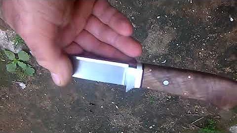 Hand made knife with frame handle