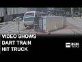 New video shows truck hit by DART train after passing red traffic light in Dallas