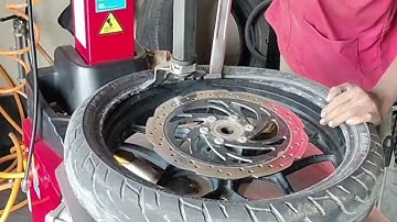 Without middle stand / paddock stand RS200 front tyre kaise change kare