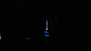 ESB Tower Lights NYPD Officer Ramos and Officer Liu. @AdamElmquist