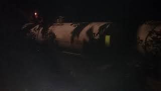 Norfolk Southern led NS mixed freight train with helper locomotives at the end of the train in Griff