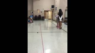 Miss Quincy dances with St. Dominic's School