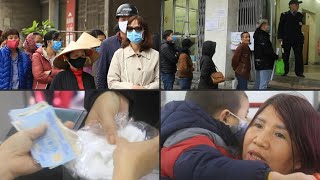 Vietnamese line up to buy face masks amid virus concern | AFP